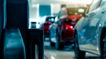 Cars displayed in a showroom, showcasing automotive excellence. Cars displayed in a showroom, showcasing automotive excellence.